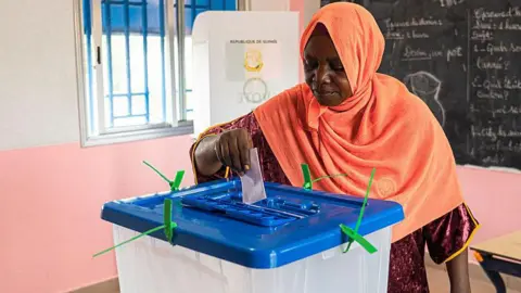 Dueling Paths: A General and a Mathematician vie for Leadership in Two African Elections
