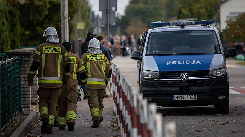 Police and first responders at the scene of a school stabbing in Leszczydol-Nowiny, Poland