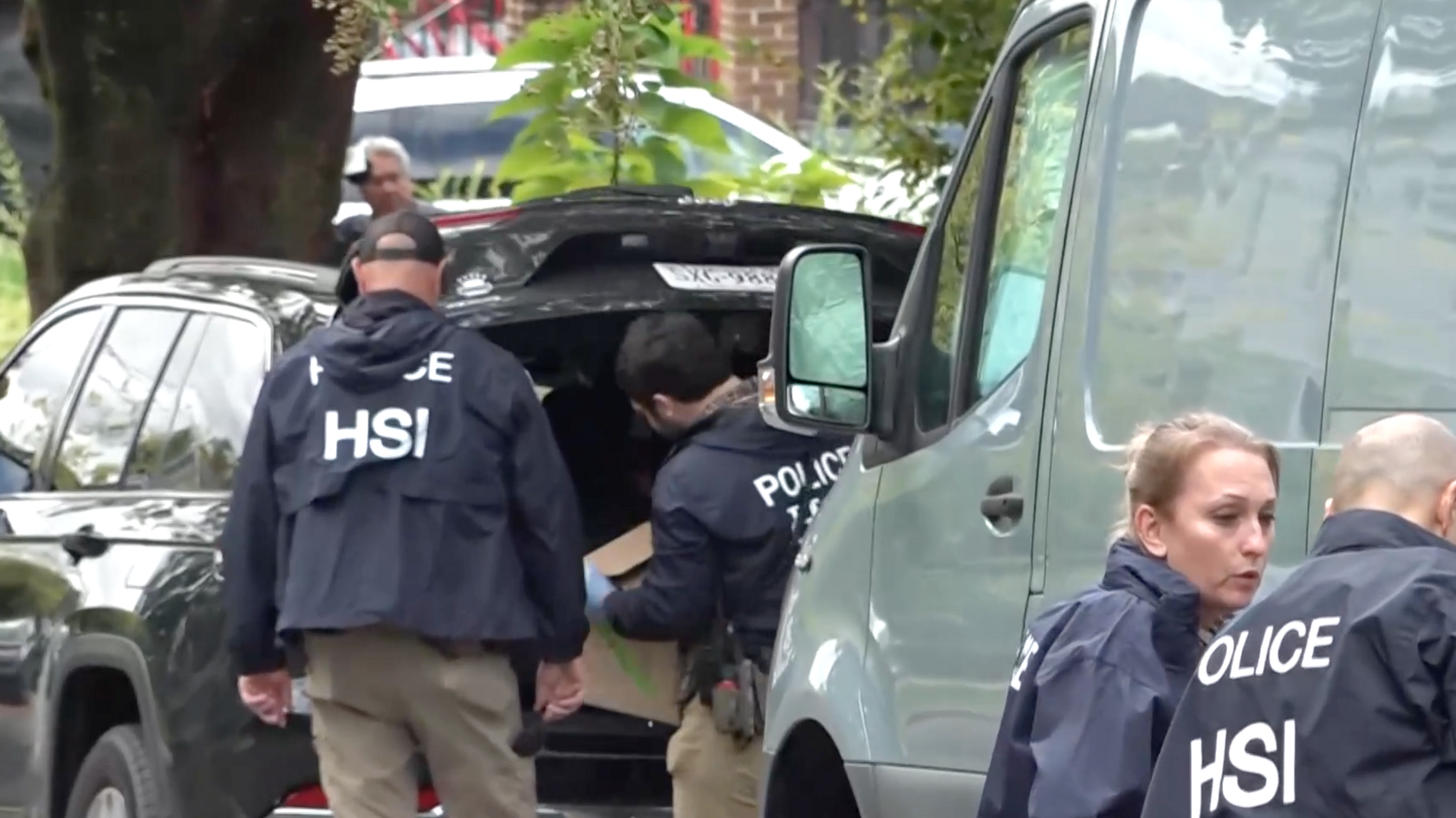 HSI agents outside Omar’s home