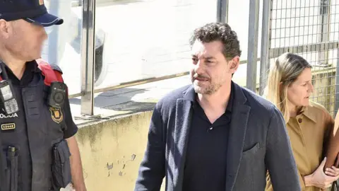 BREAKING: Mango Founder's Cliff Death Probe: Son Arrested in Murder Investigation - Is It Premeditated?