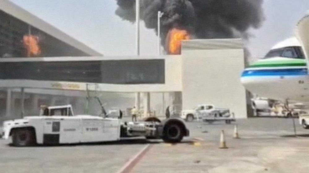 Smoke and flames rising from King Khalid Airport in Riyadh after a Houthi drone attack