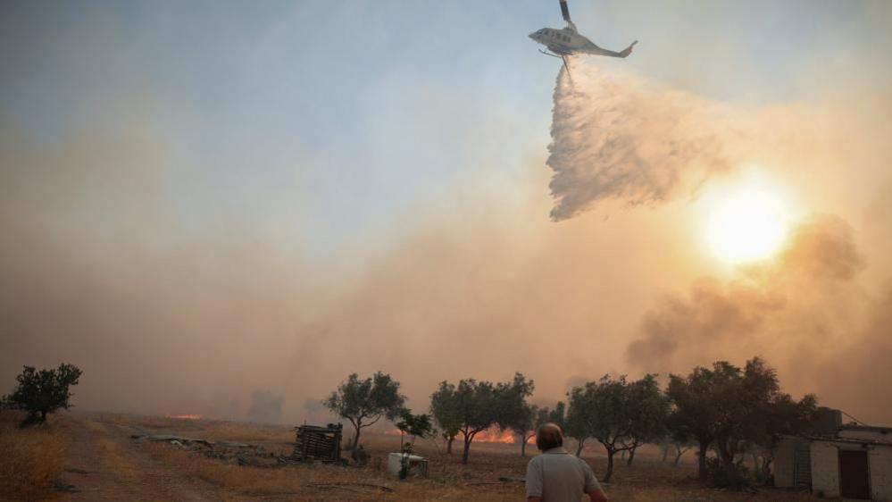 Helicopter Collision Over Greek Wildfires