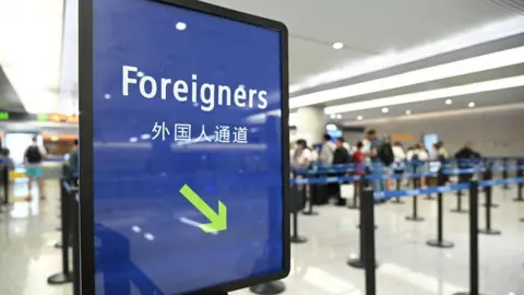 China's New Tech Visa Sparks Discontent Among Locals