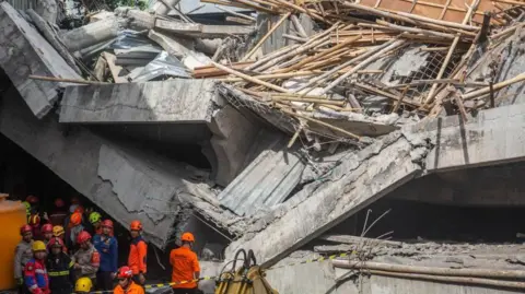 Tragedy Strikes as Indonesian School Building Collapses, Leaving Three Dead and Many Trapped