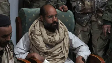 Saif al-Islam Gaddafi, Son of Former Libyan Leader, Reportedly Shot Dead
