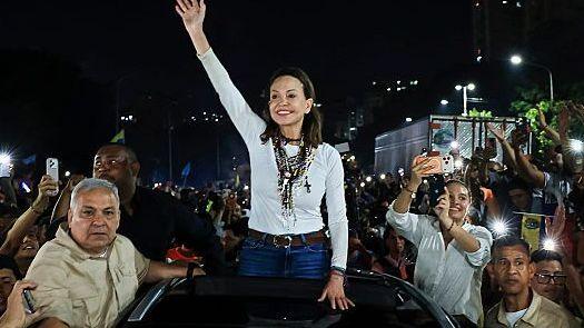 Maria Corina Machado greeted by supporters in Caracas
