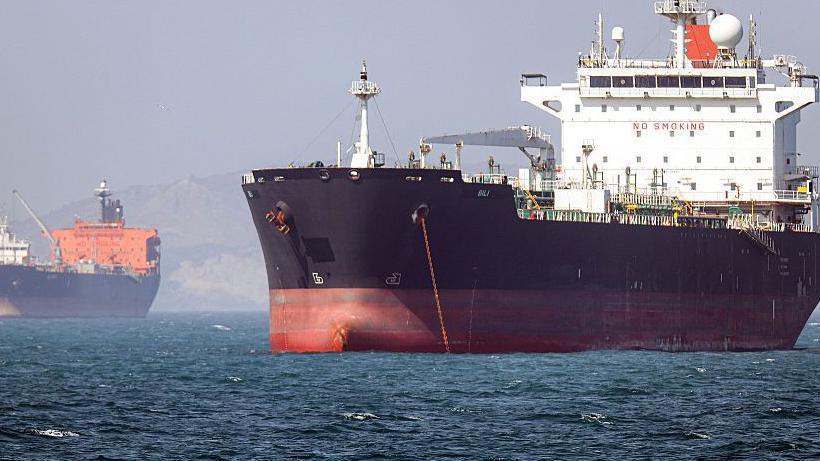 Oil prices slide to three‑week low as US officials say Strait of Hormuz could reopen