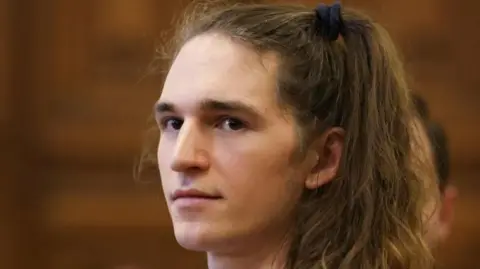 German Activist Receives Eight-Year Sentence in Hungary Following Violent Clashes at Nazi Rally